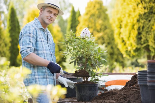 Gardener using correct protective equipment during outdoor work